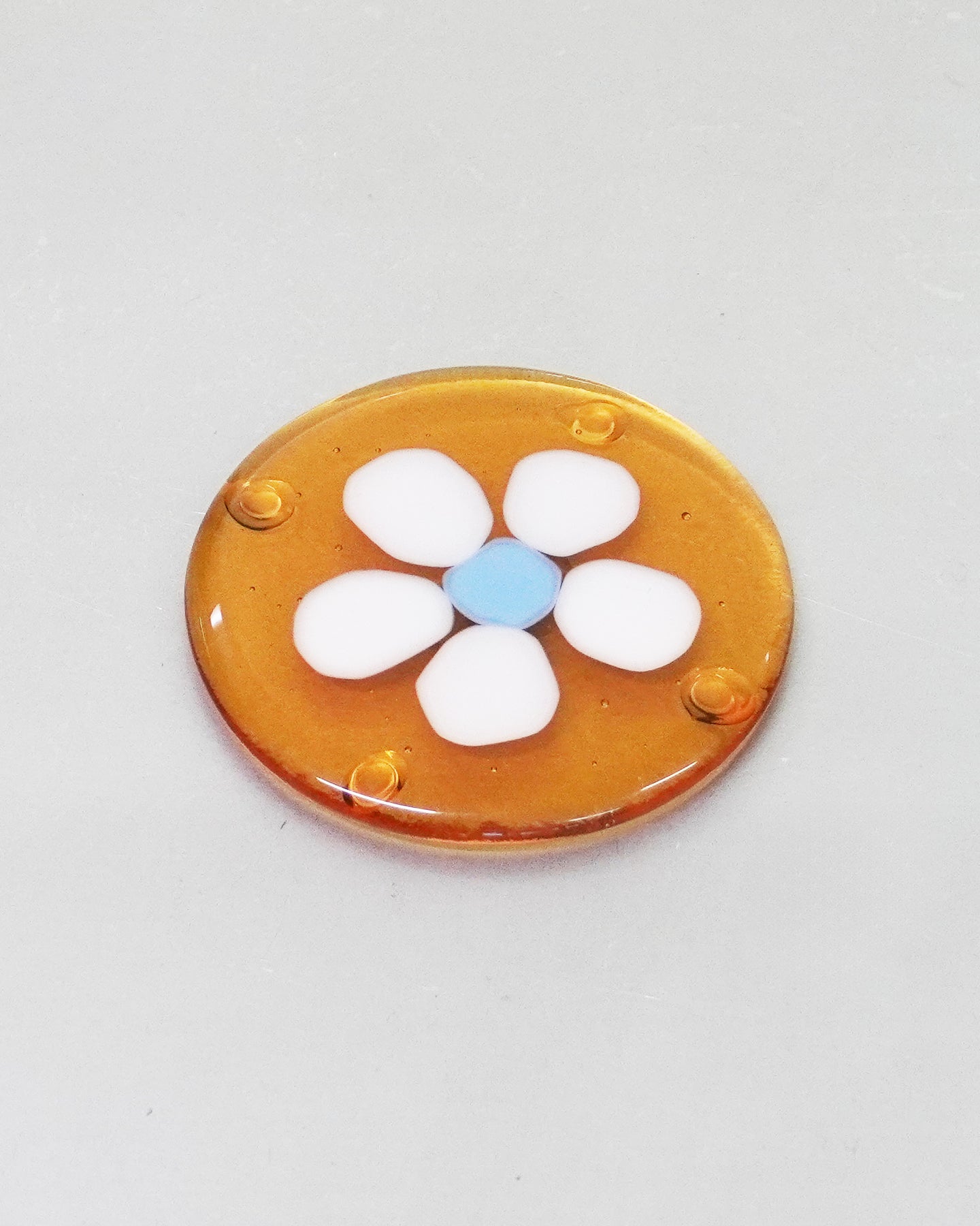 Honey Glass Coaster with Slight White Blue Flower